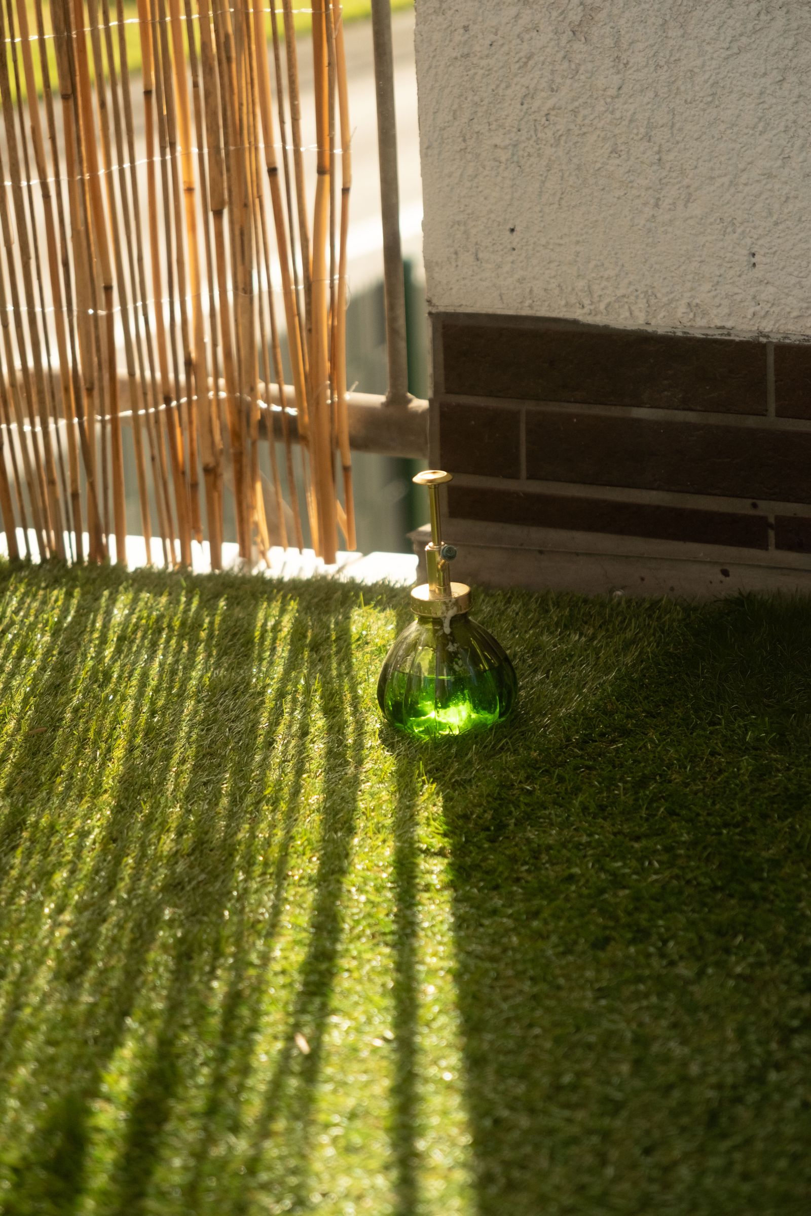 Clean artificial turf with fibers standing upright in warm light